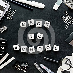 Black and white school supplies and words Ã¢â¬ÅBack to schoolÃ¢â¬Â